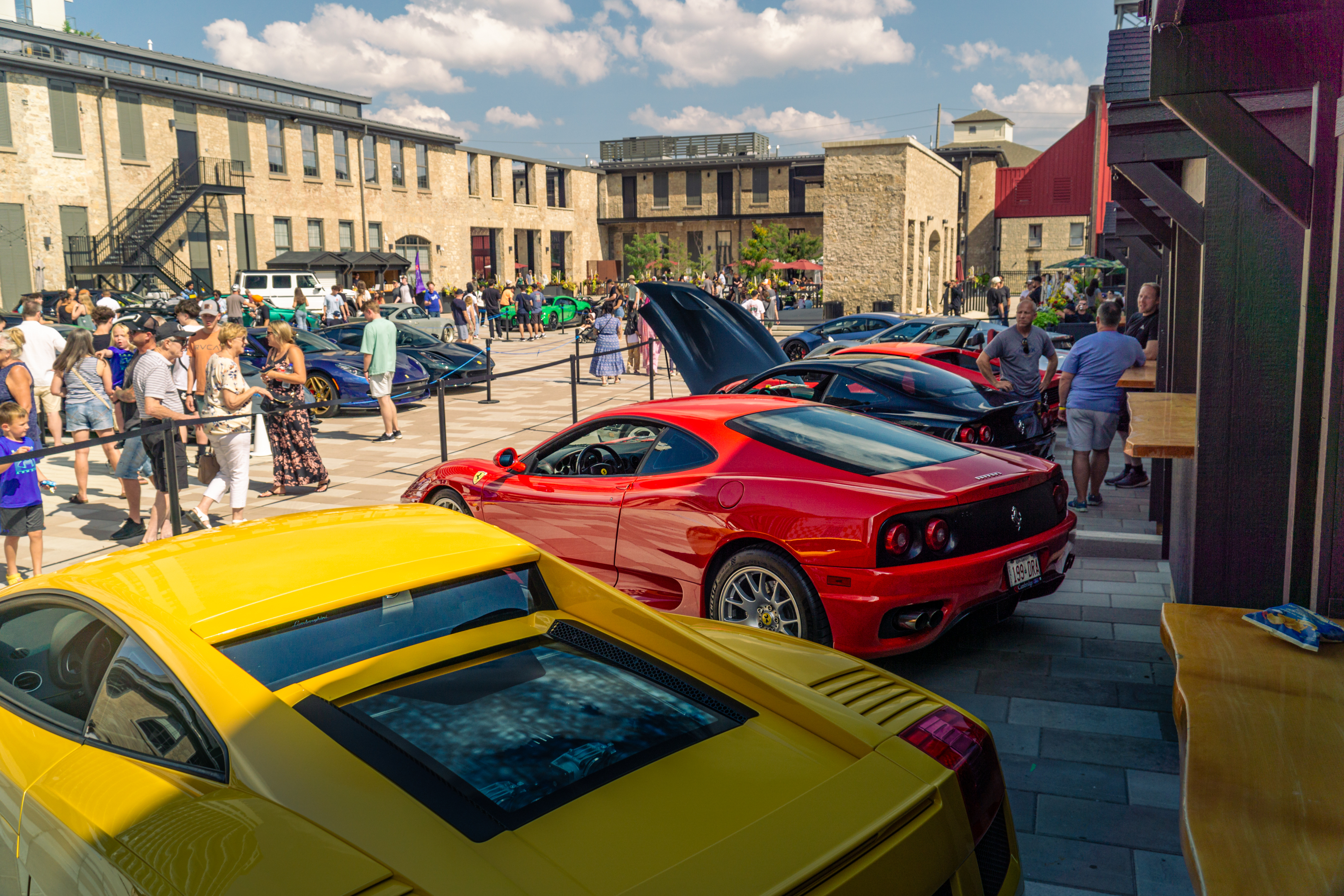 Sports cars and guests gathered in the Gaslight District