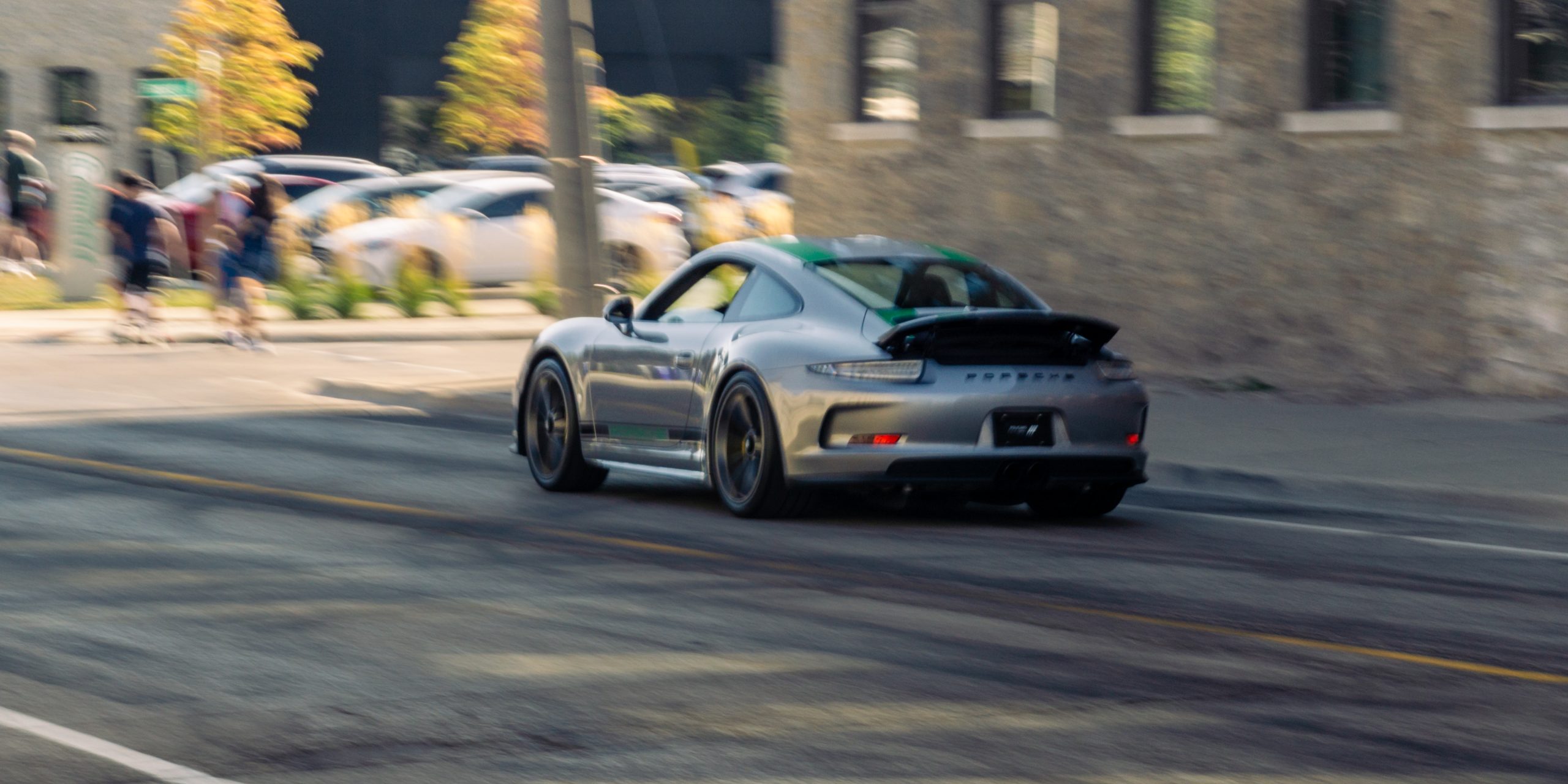 Line of cars and attendees at GDCS Charity Car Show 2024